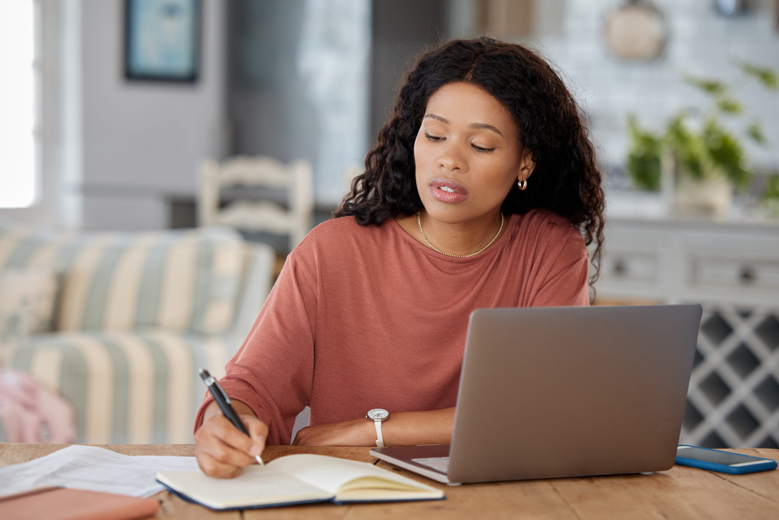 woman-notebook-laptop-home-planning-schedule-finance-research-budget-freelancer-savings-technology-investment-strategy-online-course-accounting-trading-scaled